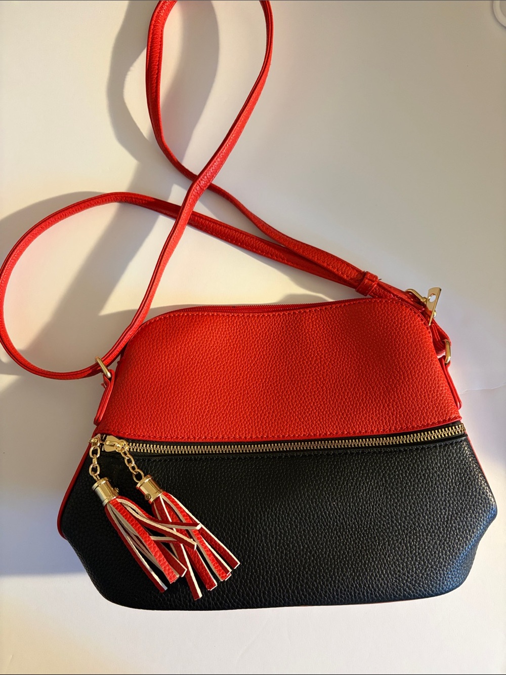 Red & Black Crossbody Bag with Tassel Accent